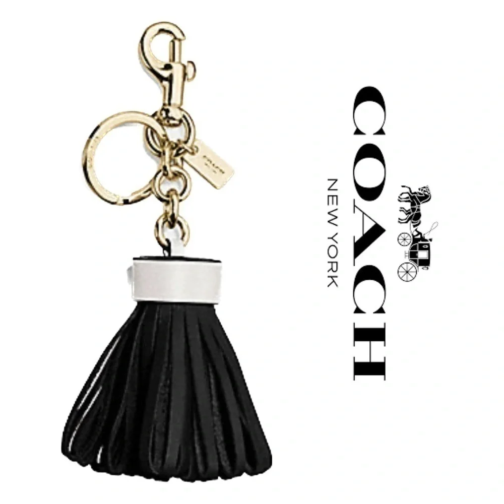 COACH LEATHER TASSEL BAG CHARM (F58505)
GOLD/BLACK KEY CHAIN KEYCHAIN - Picture 12 of 12